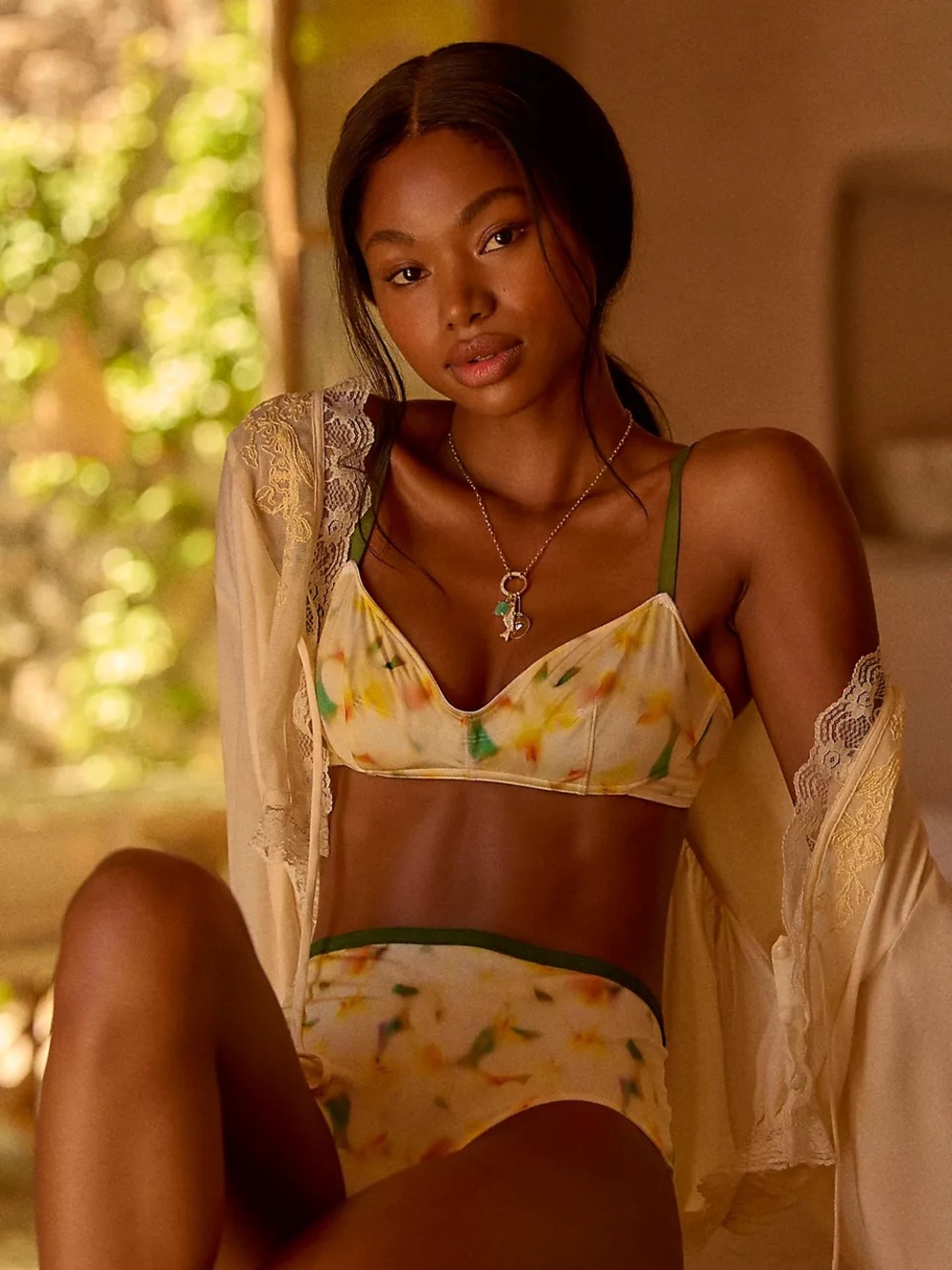 Anthropologie/Lyrebird Cream Bralette with Green Straps and Multicolor Print